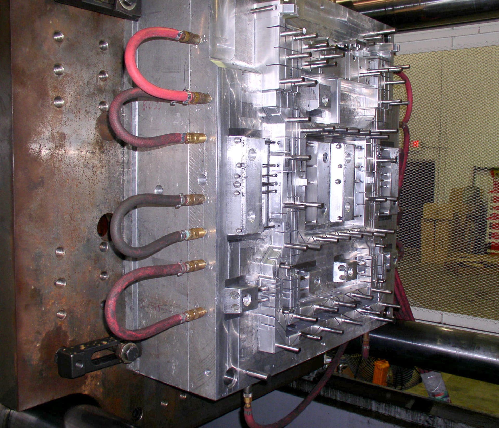 Injection mold tooling showing machined cavity detail